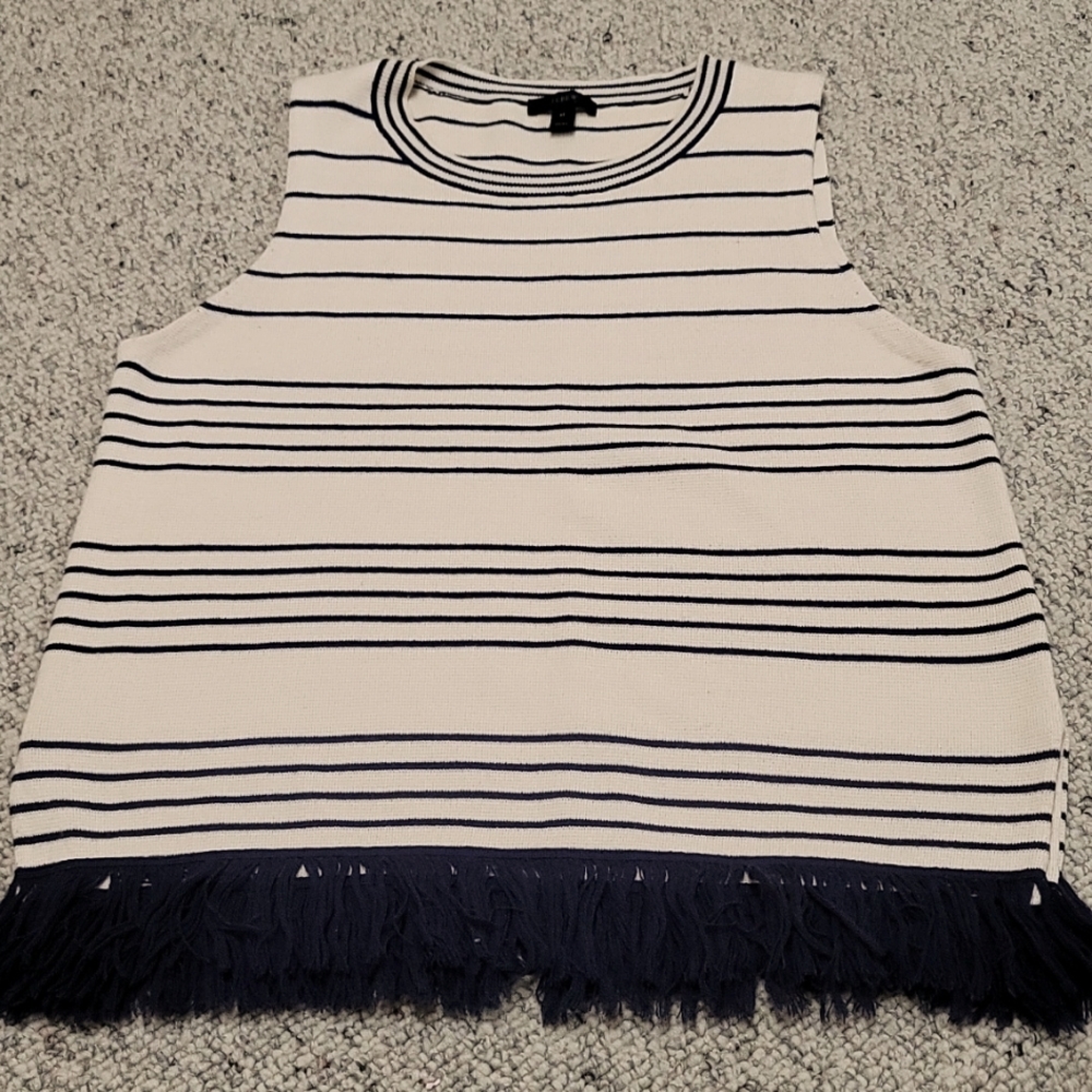 Ladies sleeveless blue and white striped top.